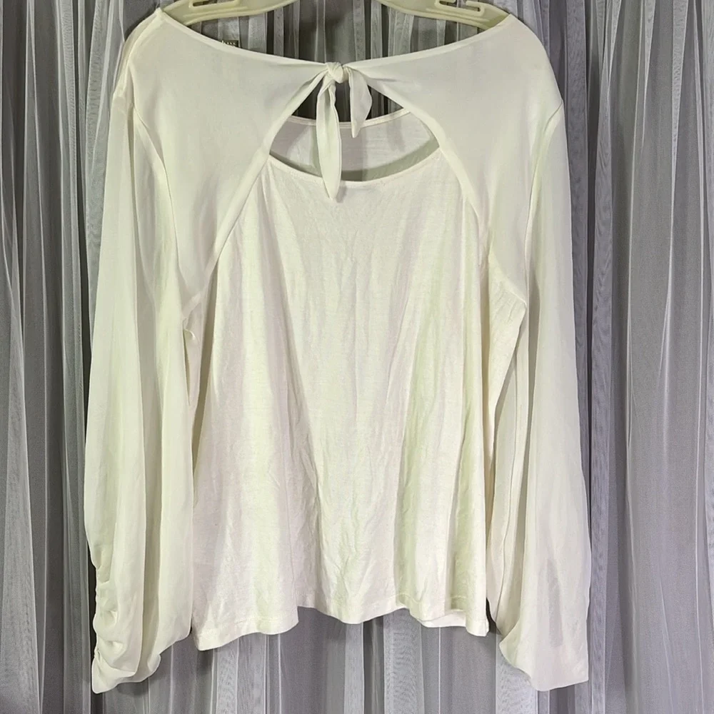 Stretchy cream sheer sleeves blouse! Tie back with key hole!